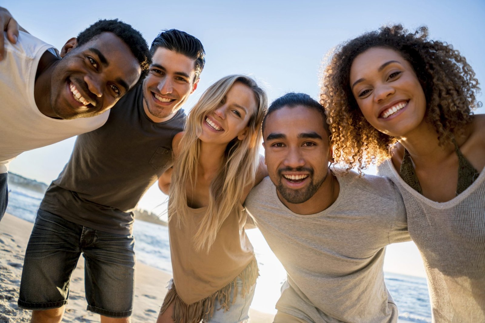 happy-group-of-friends-at-the-beach